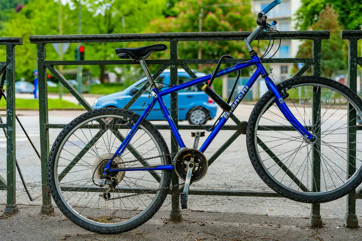 urban cycling, city bike, street photography, commute, eco-friendly transport, bicycle parking, urban lifestyle, sidewalk, metropolis, pavement. - best bike locks for urban commuting