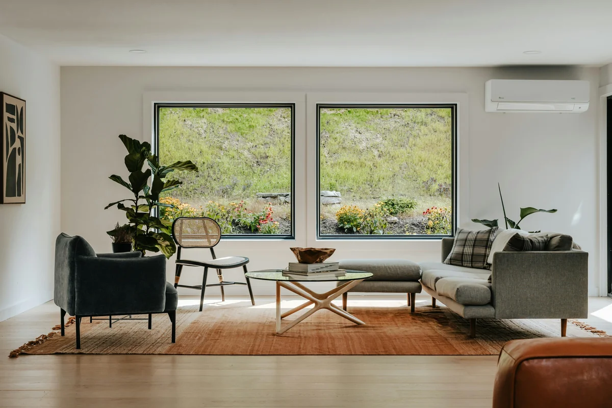 Living room with 2 large windows (IG: @clay.banks) - best value air purifiers for large living rooms