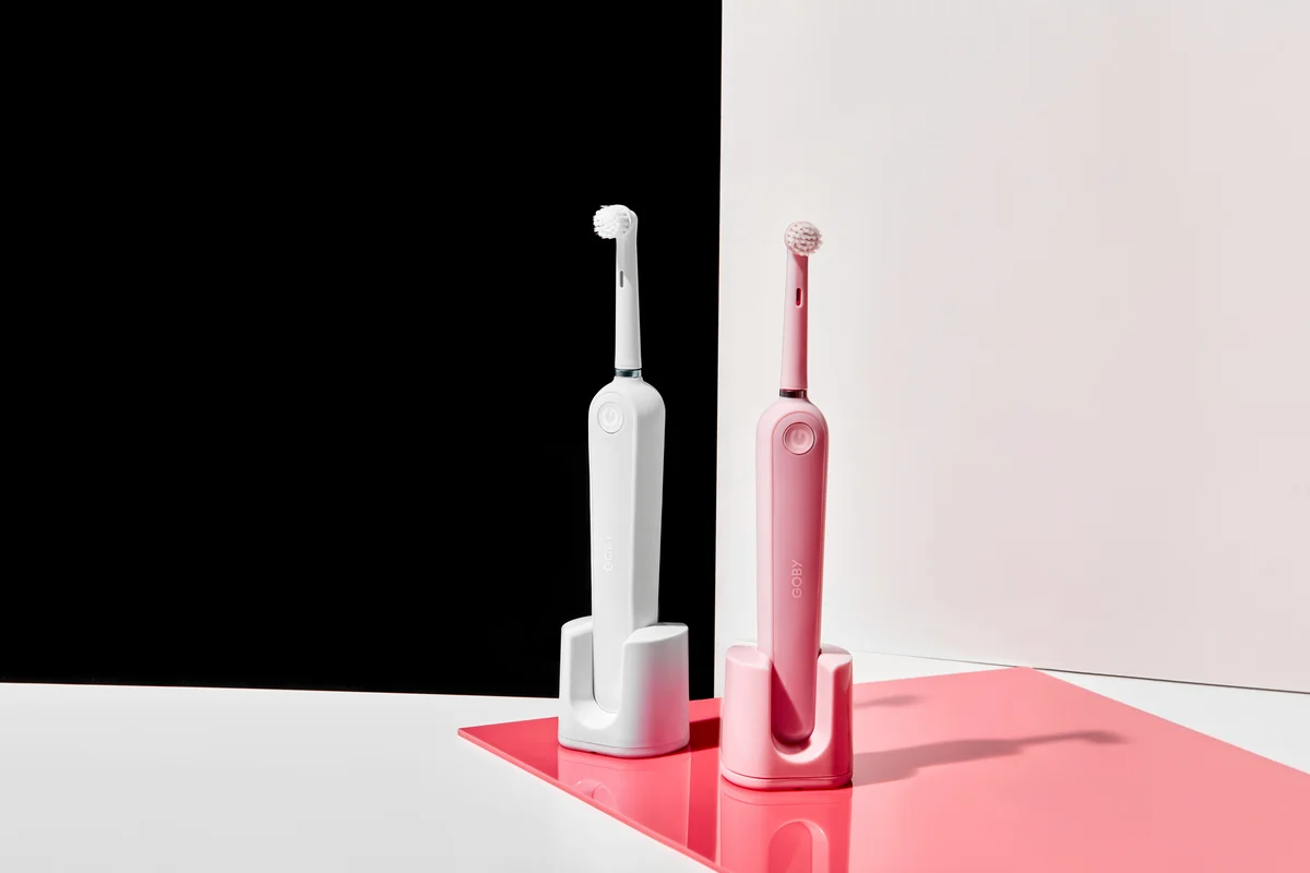 two electronic toothbrushes - budget friendly electric toothbrushes with long battery life