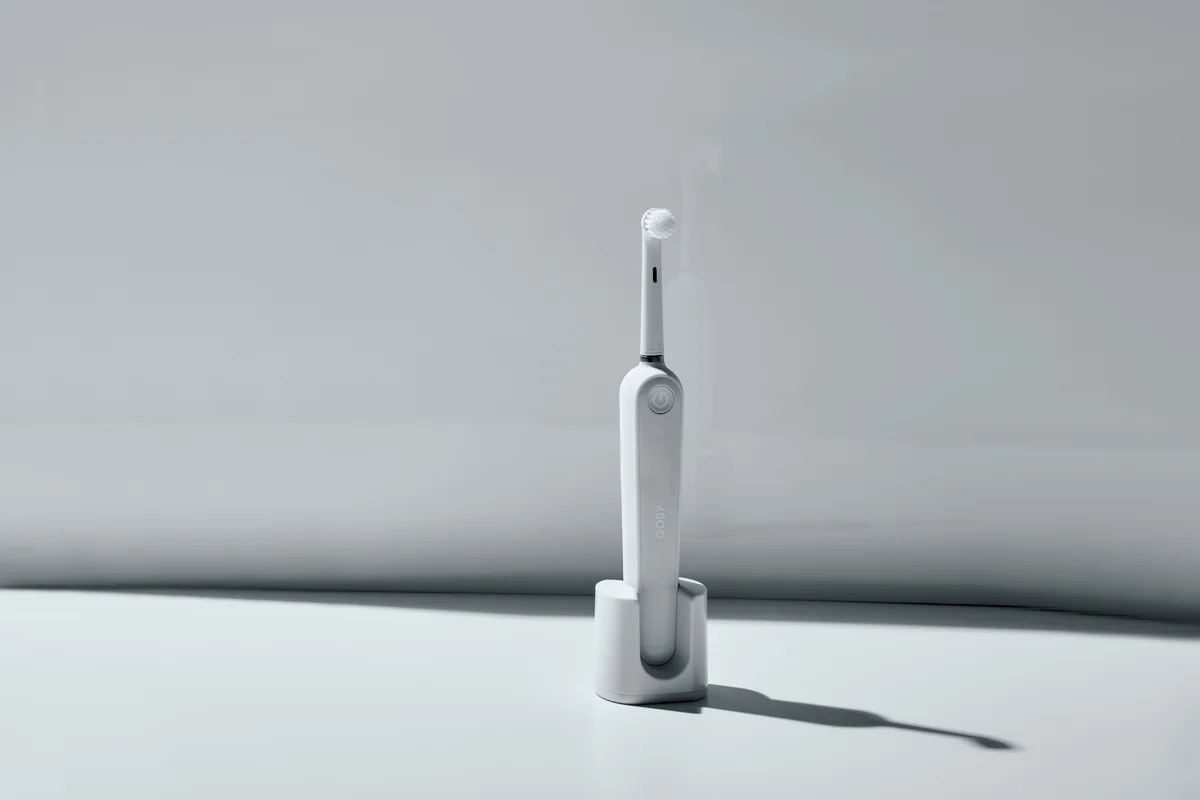 white wireless device - budget friendly electric toothbrushes with long battery life