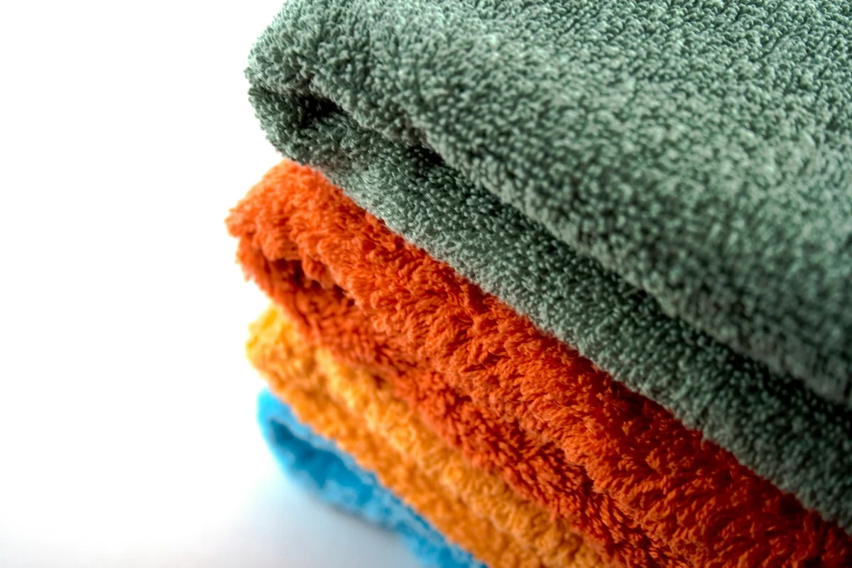 A stack of towels folded on top of each other - most durable bath towels for everyday use
