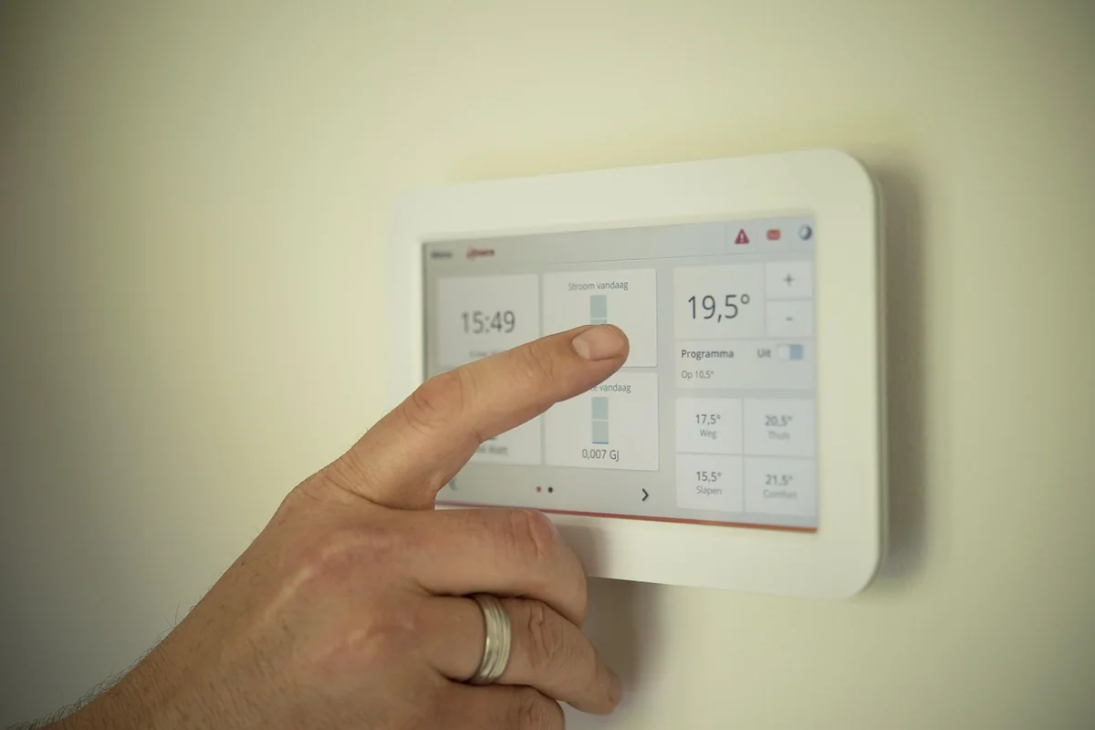 tablet, heating, man, pointing, manual, technology, person, male, computer, home, modern, system, energy, control, people, temperature, app, heating, heating, heating, heating, heating, temperature, temperature, temperature, temperature - top 10 must have smart home devices for beginners