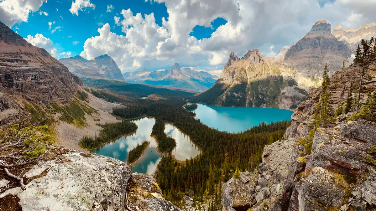 Turquoise lakes nestled in a rugged mountain valley. - adventure vacation destination - top rated handheld garment steamers for travel